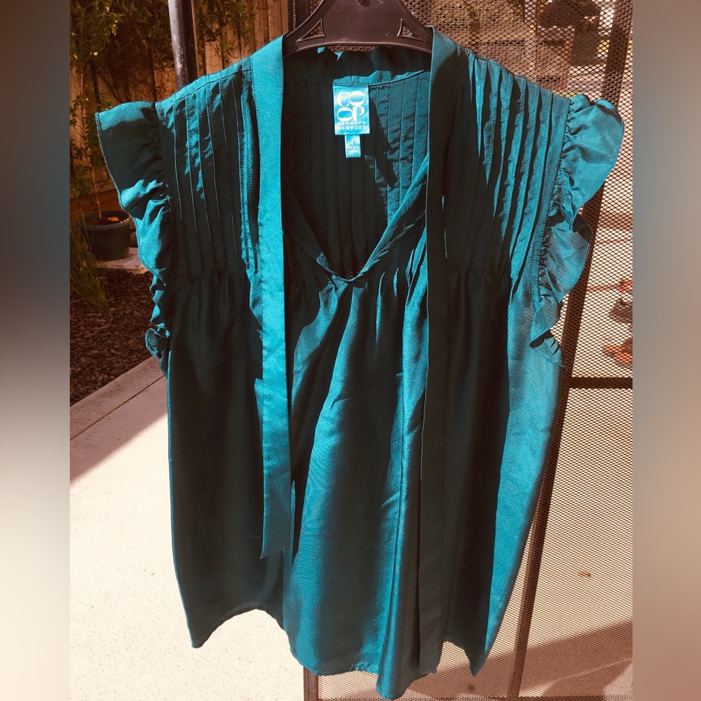 Woman’s sleeveless silk top